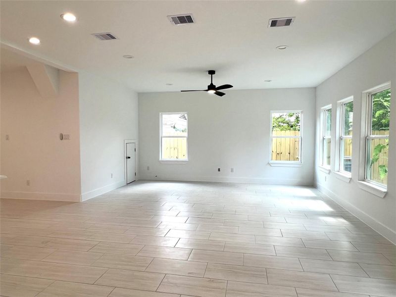 Expansive, sunlit living area perfect for relaxation and entertaining.