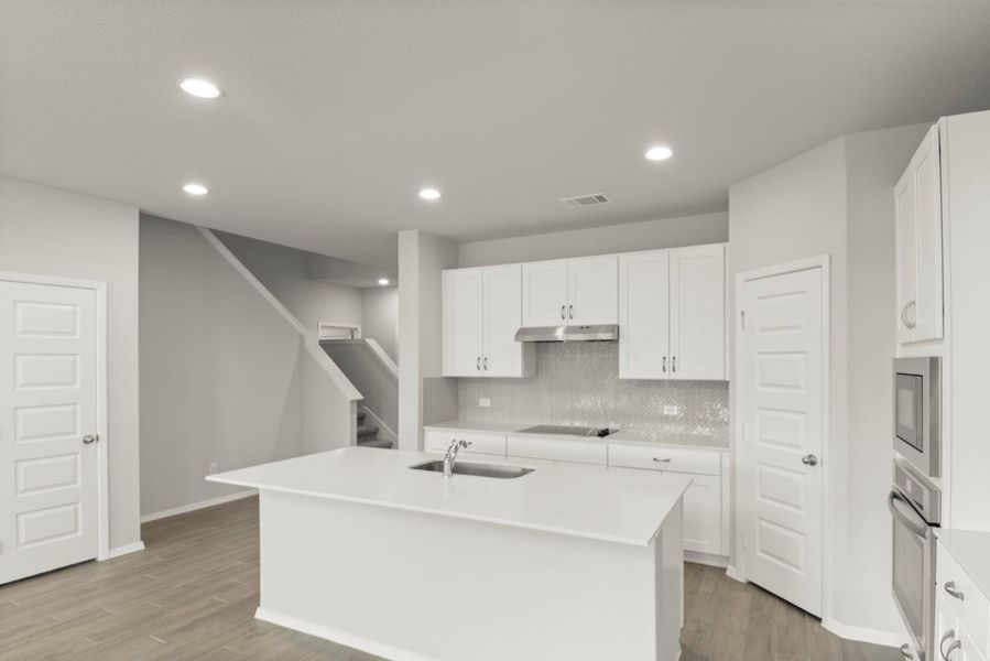 Furnished interior view inside a new home in Oaks at San Gabriel, Georgetown (Image 14).