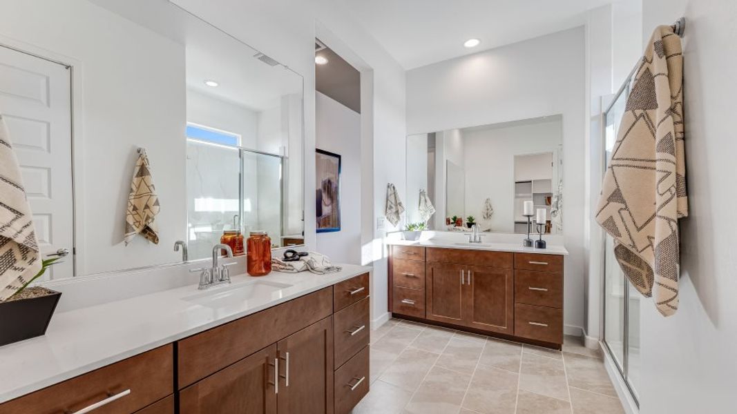 Separate vanities in the owner's bathroom