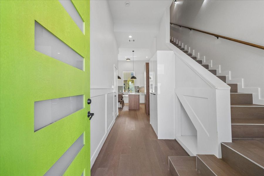 Welcoming entry foyer offering a seamless view into the open-concept living spaces with clean contemporary finishes throughout. Welcoming entry foyer offering a seamless view into the open-concept living spaces with clean contemporary finishes throughout.