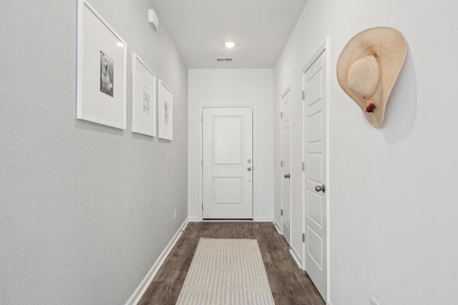 Furnished interior view inside a new home in Lindera Preserve at Cane Bay Plantation: Townhomes, Summerville (Image 3). Furnished interior view inside a new home in Lindera Preserve at Cane Bay Plantation: Townhomes, Summerville (Image 3).