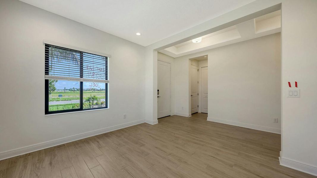 Spacious, unfurnished interior of a new home in Palm Grove Real Estate and Homes for Sale in Lakewood Ranch, FL - Neal Communities, Lakewood Ranch (Image 27).