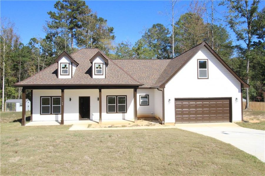 Front exterior of a new home in , Douglasville, GA, highlighting curb appeal (Image 1). Front exterior of a new home in , Douglasville, GA, highlighting curb appeal (Image 1).