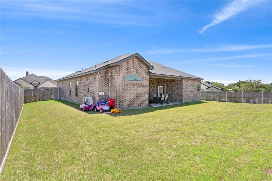 Exterior details and patio area of a home in , Belton (Image 24).