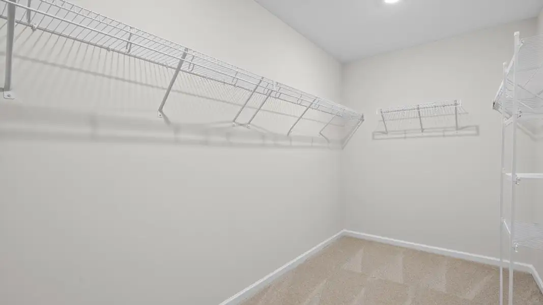 Spacious, unfurnished interior of a new home in The Townes at Anderson Farm, Wendell (Image 27).