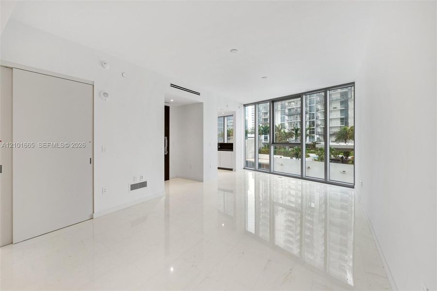 Spacious, unfurnished interior of a new home in Aston Martin Residences, Miami (Image 17).