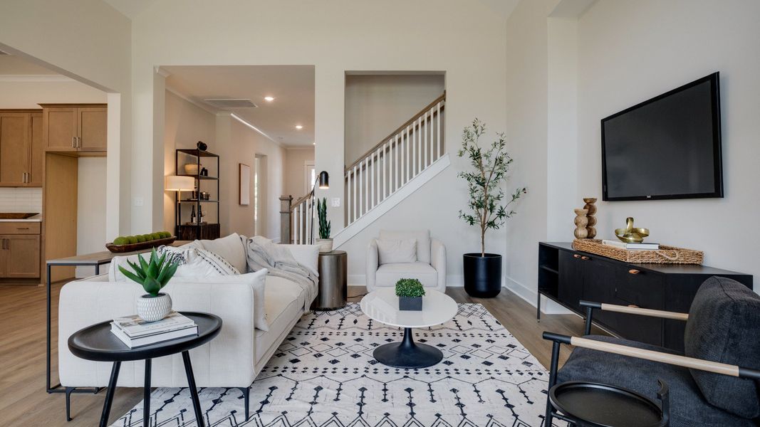 Hard surface flooring with high ceilings for an elevated living area Hard surface flooring with high ceilings for an elevated living area