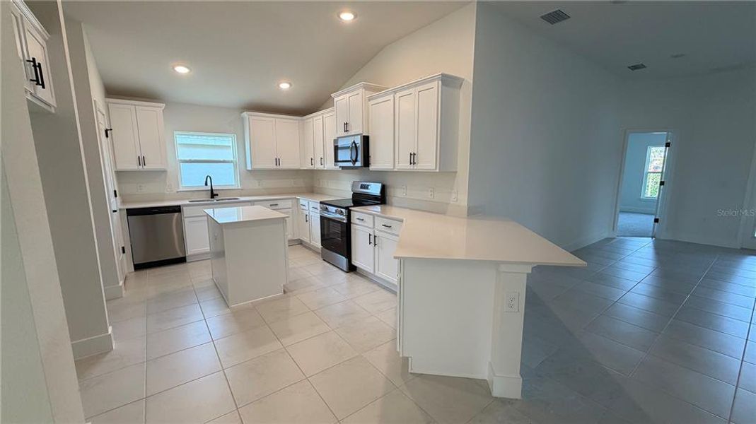 Furnished interior view inside a new home in Watercress Cove, North Port (Image 4).