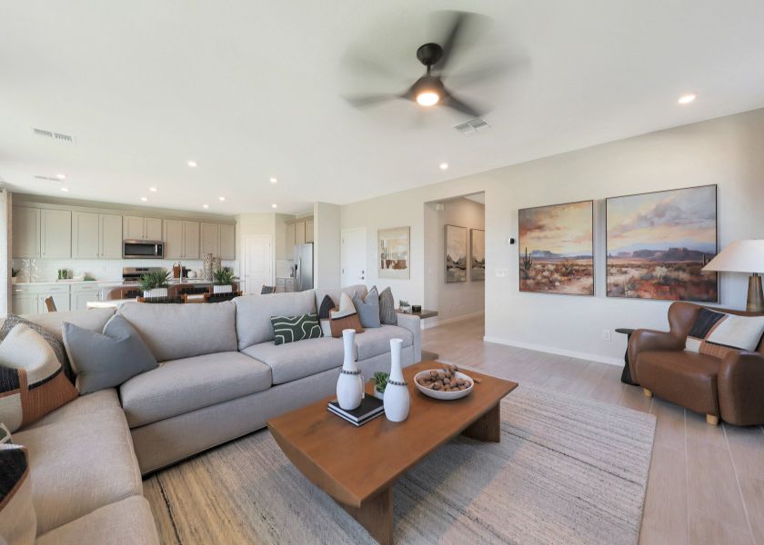 A living room with a couch and a coffee table.
