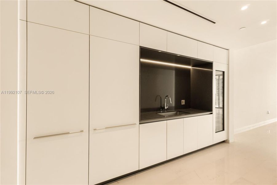 Furnished interior view inside a new home in Aston Martin Residences, Miami (Image 11). Furnished interior view inside a new home in Aston Martin Residences, Miami (Image 11).