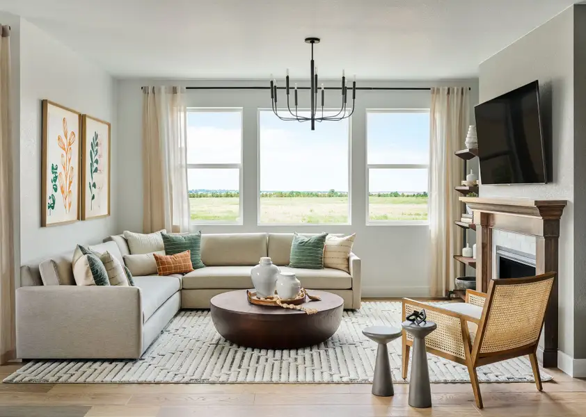 Representative furnished interior of a home built from the Boulder by Taylor Morrison in Parterre City Collection, Thornton (Image 1).