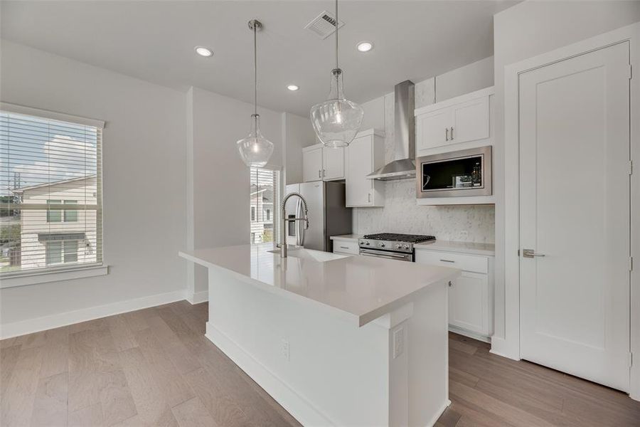 Furnished interior view inside a new home in Collin Creek, Plano (Image 11).