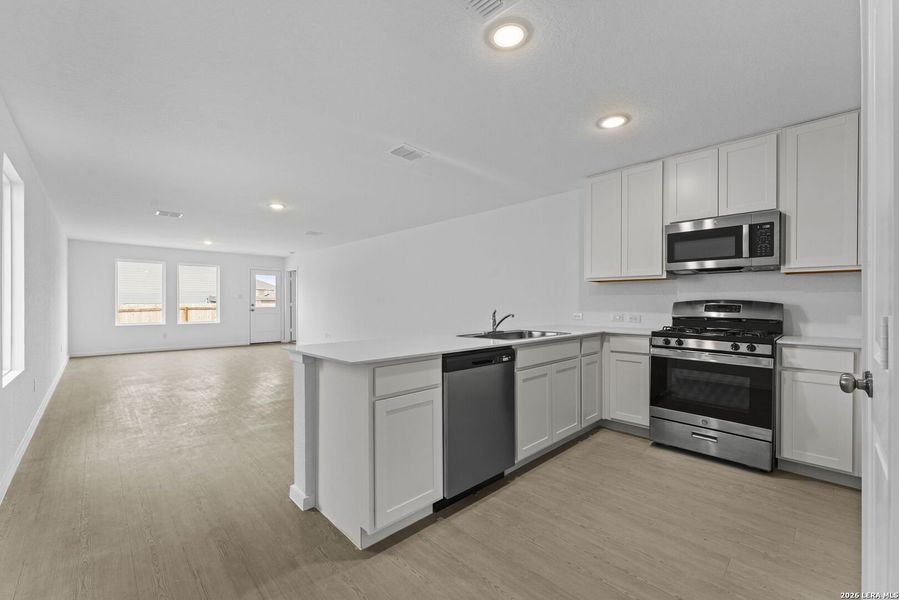 Furnished interior view inside a new home in Randolph Crossing: Cottage Collection, Converse (Image 7). Furnished interior view inside a new home in Randolph Crossing: Cottage Collection, Converse (Image 7).