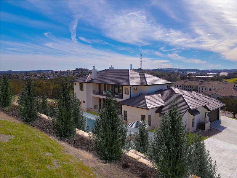 Front exterior of a new home in , Austin, TX, highlighting curb appeal (Image 21). Front exterior of a new home in , Austin, TX, highlighting curb appeal (Image 21).