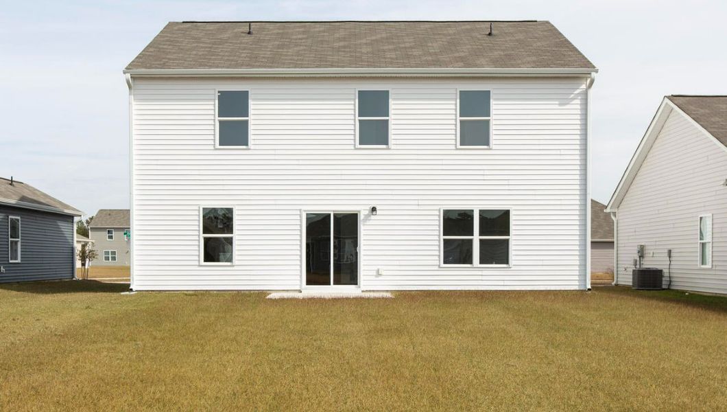 Front exterior of a new home in Driftwood, Richlands, NC, highlighting curb appeal (Image 2).