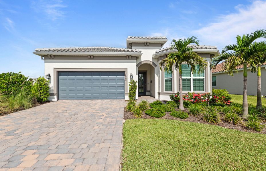 Representative exterior photo of a completed home built from the Prestige by Del Webb in Del Webb Oak Creek, North Fort Myers, FL (Image 20).