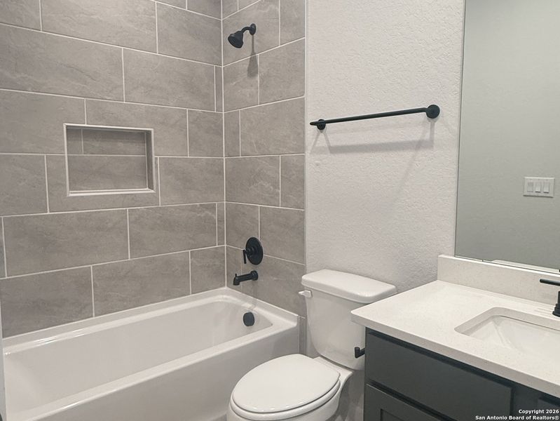 Furnished interior view inside a new home in Weston Oaks, San Antonio (Image 4).