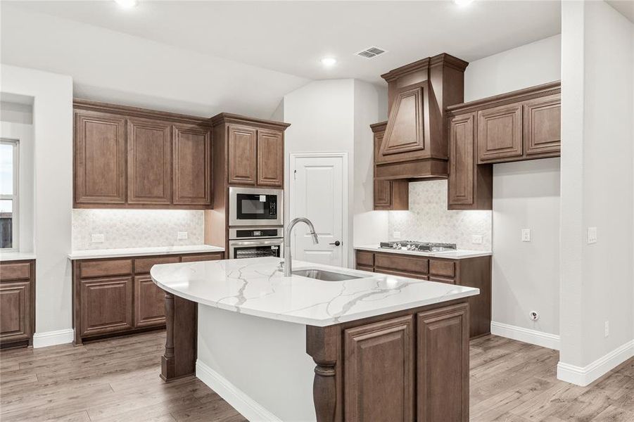 Furnished interior view inside a new home in Stone River Glen 60s, Royse City (Image 7).