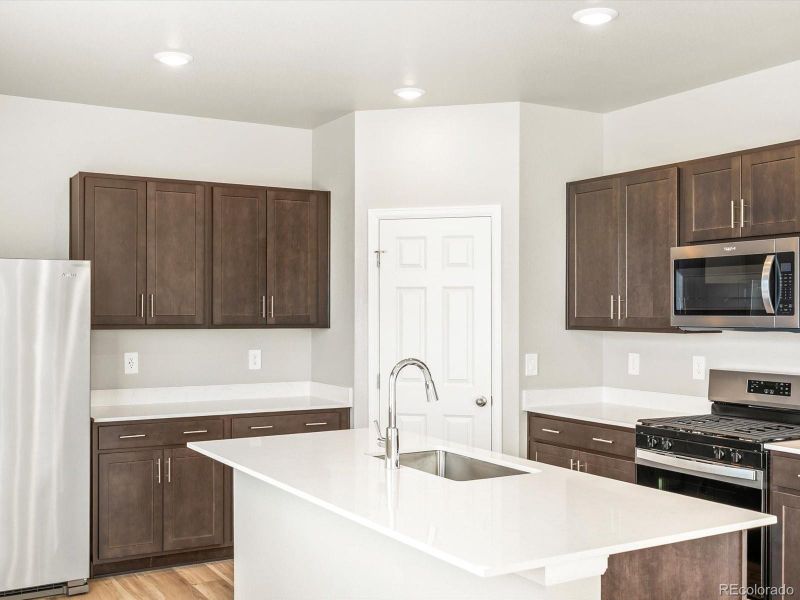 Furnished interior view inside a new home in Revere at Johnstown, Johnstown (Image 7).
