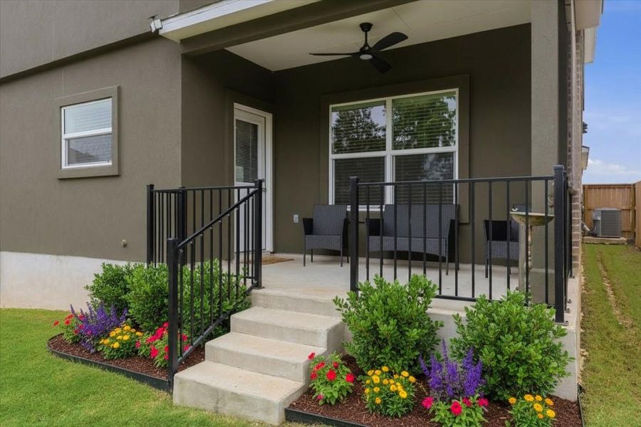 Backyard covered porch-VS with flowers Backyard covered porch-VS with flowers