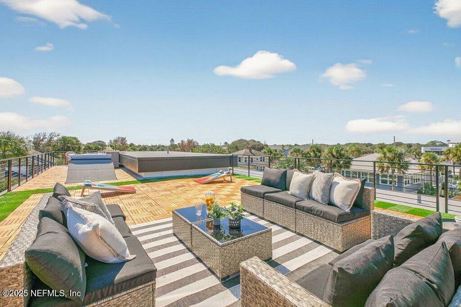 Exterior details and patio area of a home in , Neptune Beach (Image 3).
