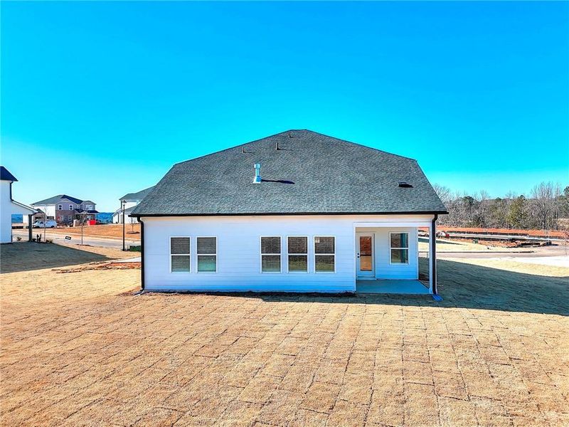 Exterior details and patio area of a home in River Pointe, Monroe (Image 32).