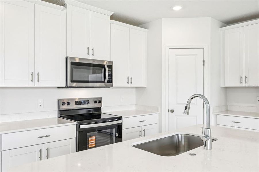 Furnished interior view inside a new home in Crosswinds - Classic Series, Haines City (Image 6). Furnished interior view inside a new home in Crosswinds - Classic Series, Haines City (Image 6).