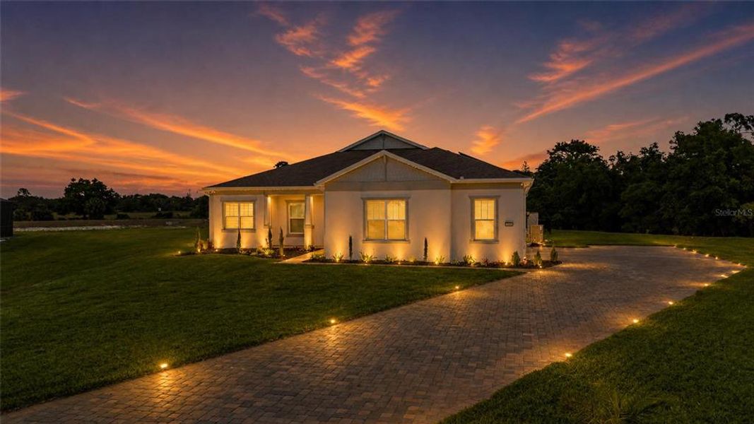 Front exterior of a new home in , Orlando, FL, highlighting curb appeal (Image 33).
