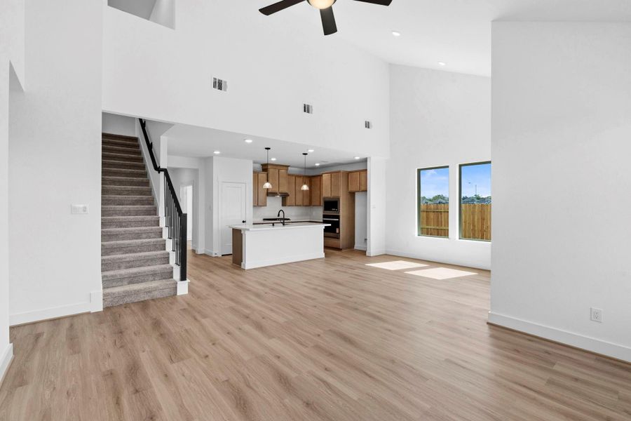 The open layout flows seamlessly into the dining and living areas, creating a bright and inviting space for cooking, entertaining, and everyday life. The open layout flows seamlessly into the dining and living areas, creating a bright and inviting space for cooking, entertaining, and everyday life.