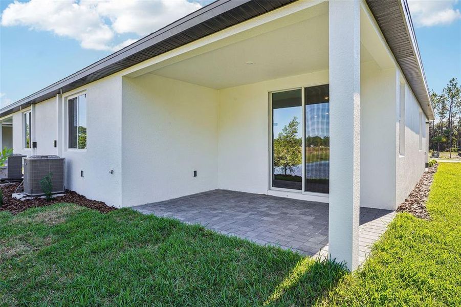 Exterior details and patio area of a home in Ridgehaven - Villas, Ormond Beach (Image 23).