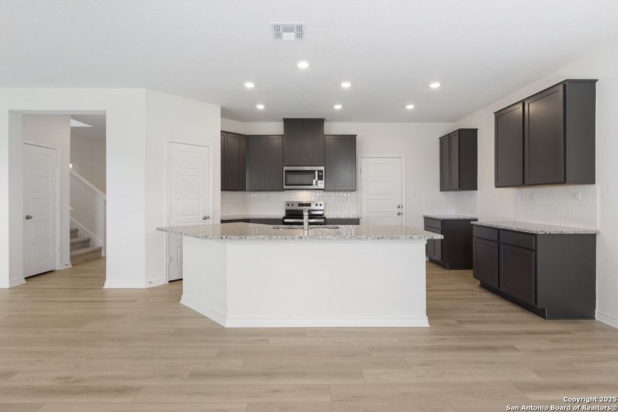 Furnished interior view inside a new home in Woodside Farms, Seguin (Image 7). Furnished interior view inside a new home in Woodside Farms, Seguin (Image 7).