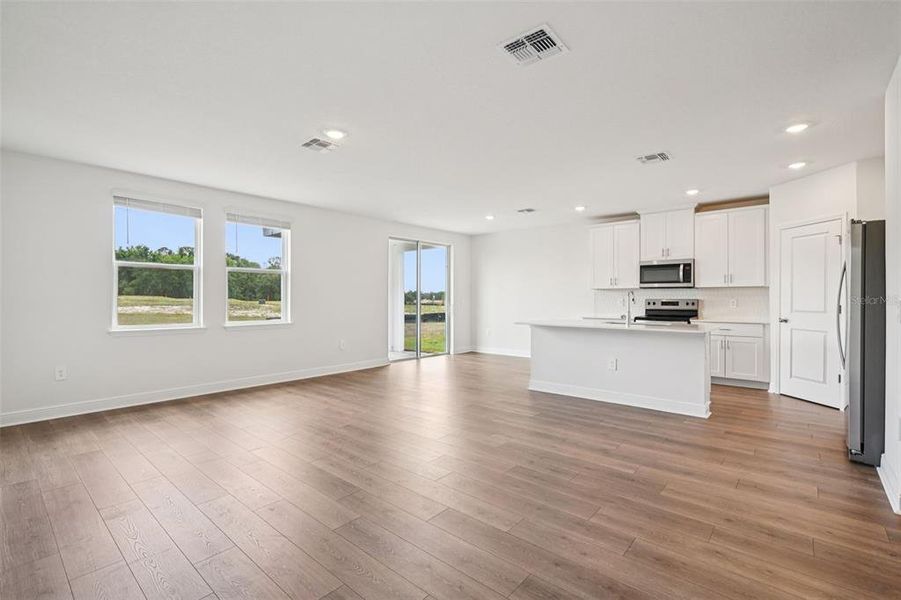 Spacious, unfurnished interior of a new home in The Reserve at Hammock Oaks - Signature Series, Lady Lake (Image 29).