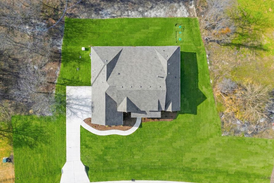 Front exterior of a new home in Rolling Creek Ranch, Aledo, TX, highlighting curb appeal (Image 21).