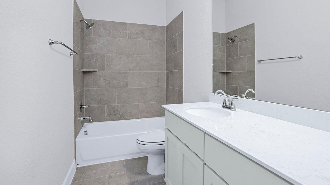 Furnished interior view inside a new home in Evergreen 70', Conroe (Image 7).