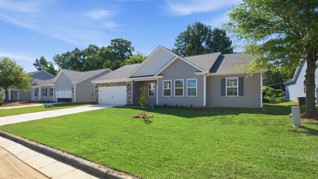 Front exterior of a new home in Tyler - Home on the Lake, New Bern, NC, highlighting curb appeal (Image 17).