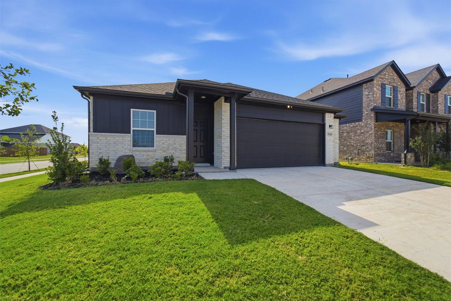 Front exterior of a new home in Sagebrook, Argyle, TX, highlighting curb appeal (Image 19).