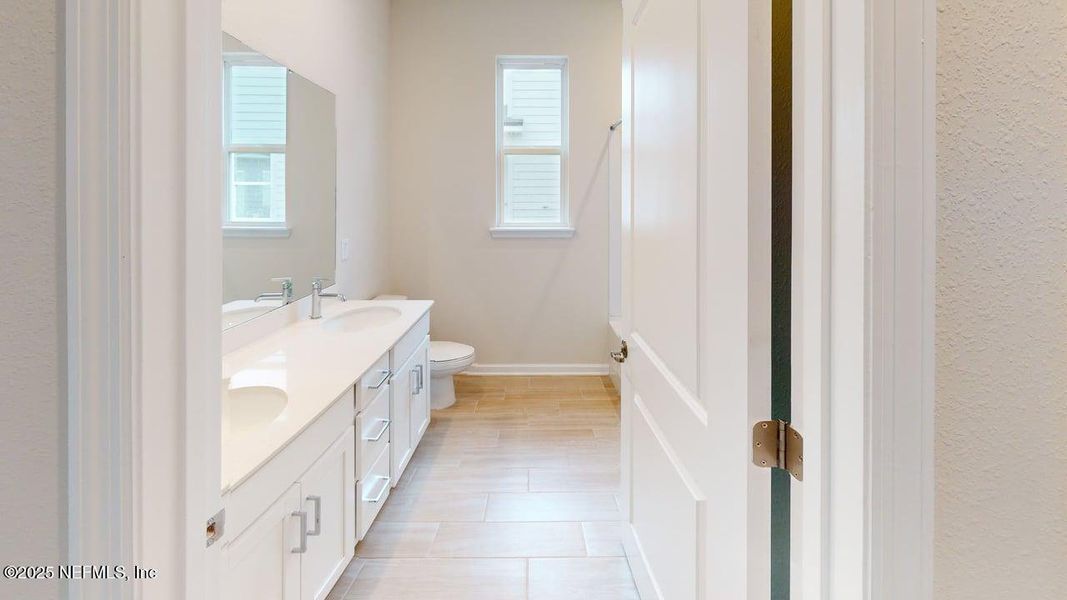 Furnished interior view inside a new home in Lakes at Bella Lago, Green Cove Springs (Image 6).