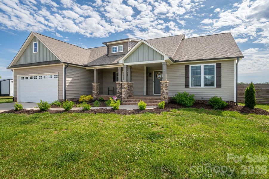Front exterior of a new home in , Lincolnton, NC, highlighting curb appeal (Image 22).