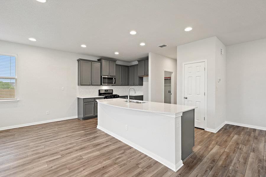Photos are of a completed model of the same floor plan and are for illustrative purposes only. Actual home is under construction and design selections, materials, and features may differ. Confirm final specifications with the New Home Consultant.