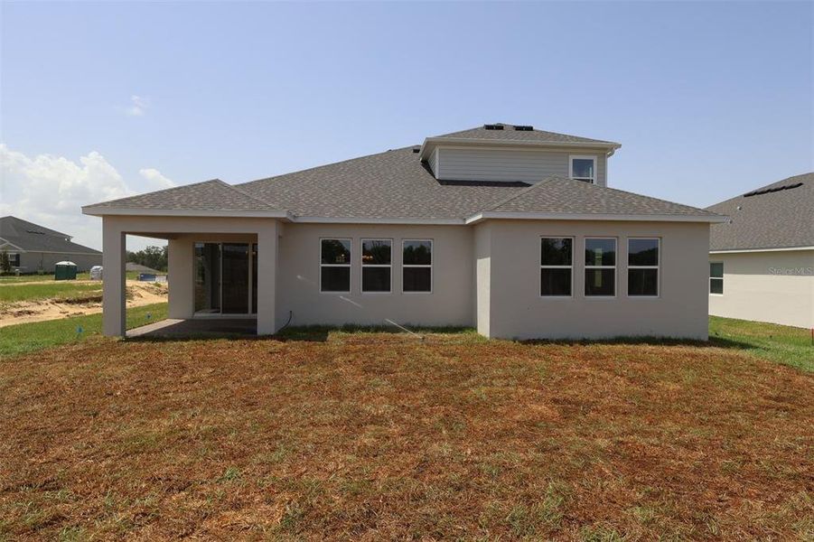 Exterior details and patio area of a home in Wolf Lake Ranch, Apopka (Image 3).