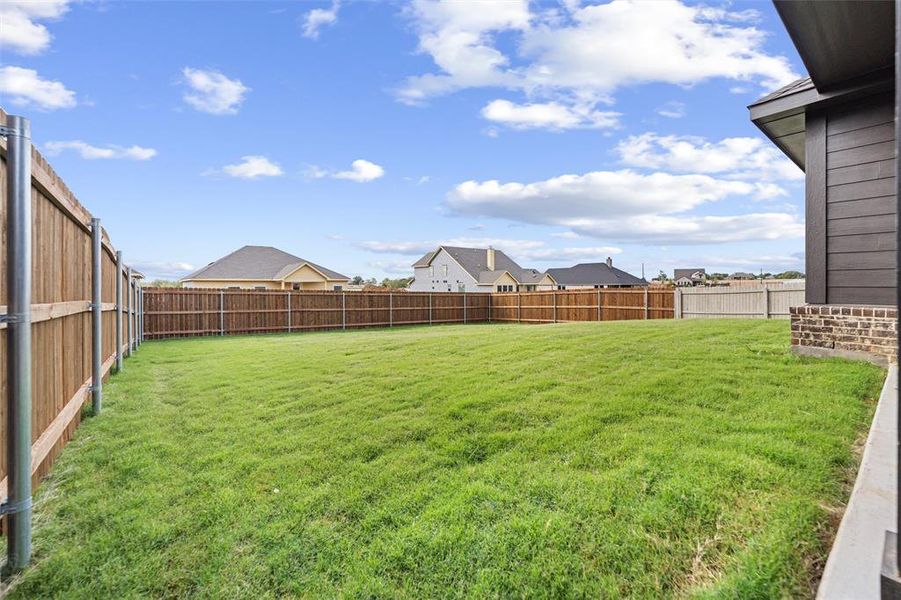 Exterior details and patio area of a home in Liberty Pointe, Gainesville (Image 24). Exterior details and patio area of a home in Liberty Pointe, Gainesville (Image 24).