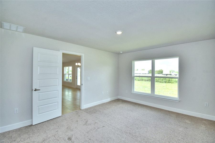 Spacious, unfurnished interior of a new home in Cadence Crossing, Auburndale (Image 35).