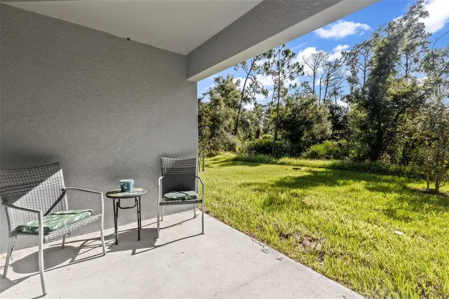 Exterior details and patio area of a home in , North Port (Image 3).