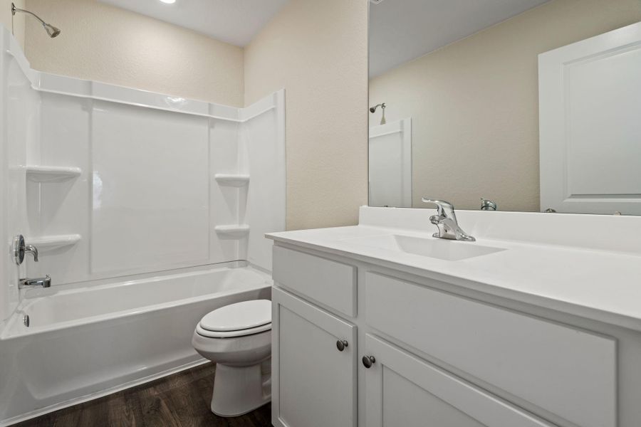 Furnished interior view inside a new home in Sweetwater Ridge, Conroe (Image 10).