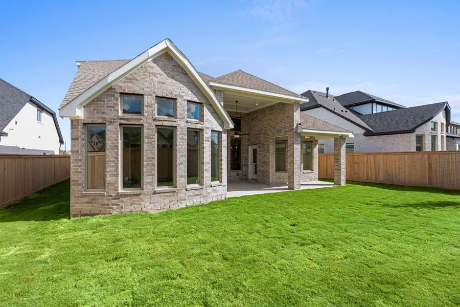 Exterior details and patio area of a home in Bridgeland 55', Cypress (Image 23).