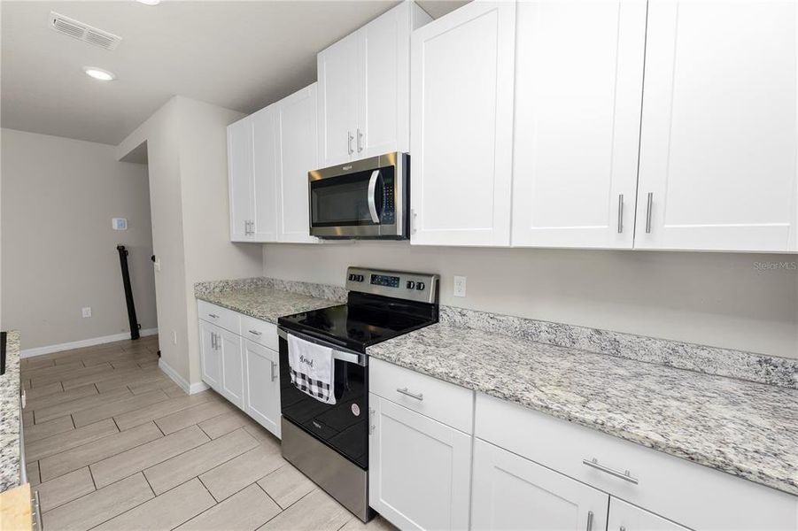 Furnished interior view inside a new home in The Reserve at Van Oaks, Auburndale (Image 12). Furnished interior view inside a new home in The Reserve at Van Oaks, Auburndale (Image 12).