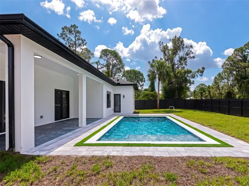 Exterior details and patio area of a home in , North Port (Image 3).