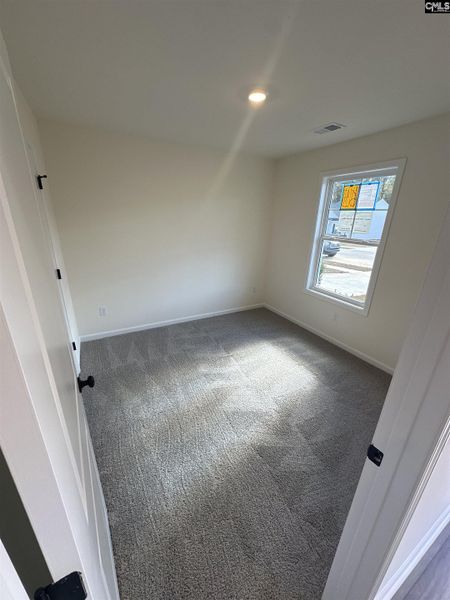 Spacious, unfurnished interior of a new home in Piney Woods Bluff, Columbia (Image 10).