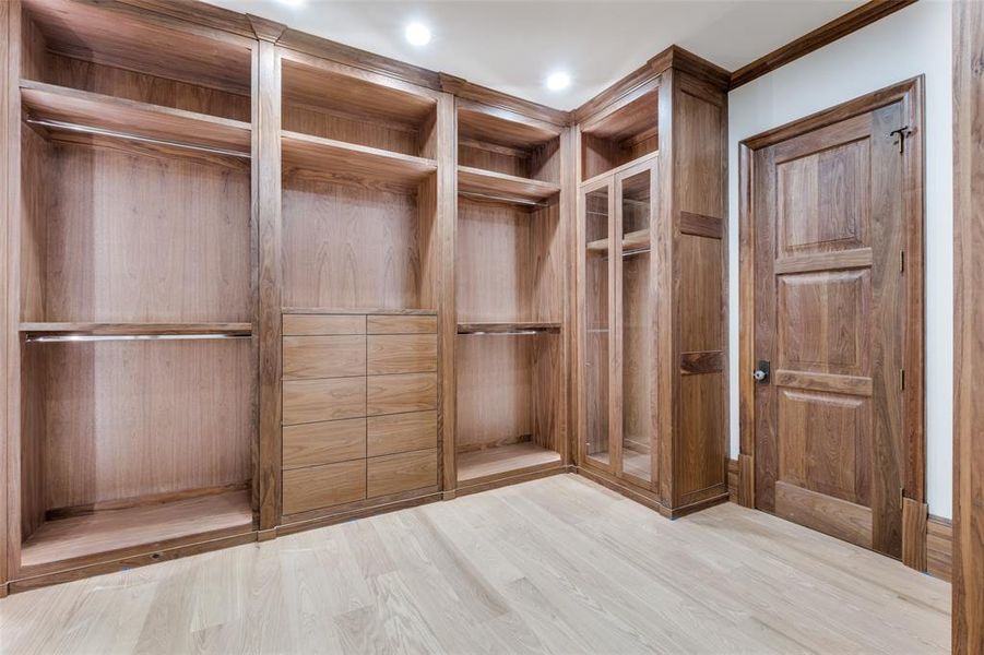 Walk in closet featuring light hardwood / wood-style floors