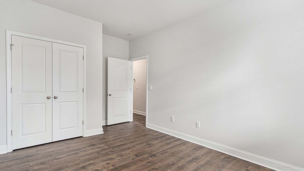 Representative unfurnished interior of a home built from the Covington by D.R. Horton in Eden Springs, Longs (Image 18).
